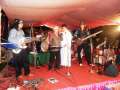Mr. Suri and friend sings with forefront on wedding day