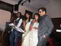 couple sings with forefront